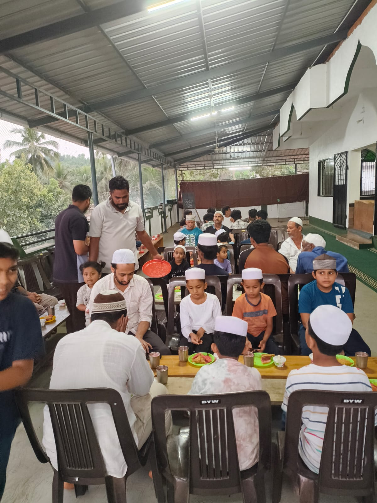 Food distribution by Badriya Youth Wing